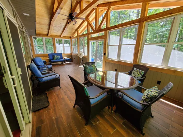 Brand new room added off living room out to firepit in backyard