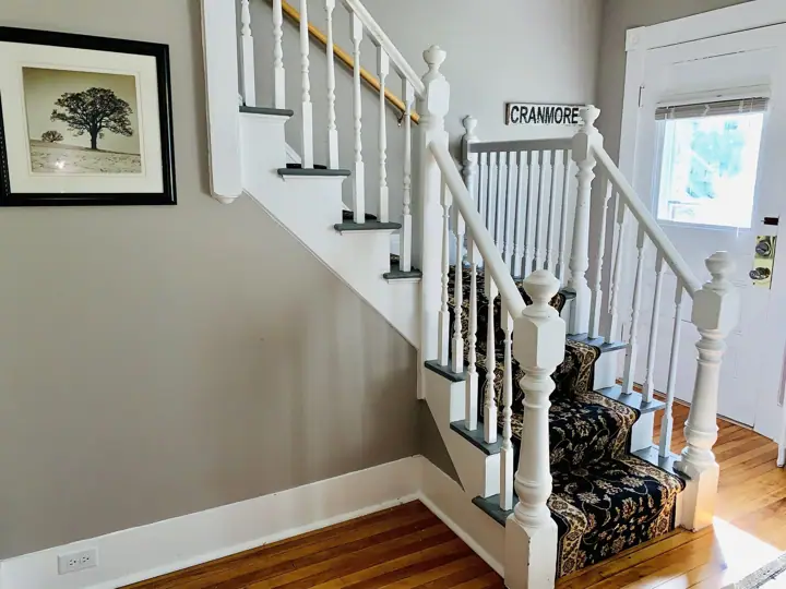 Off living room to the upstairs