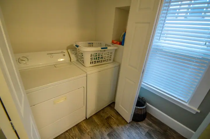 Washer dryer off dining room bath