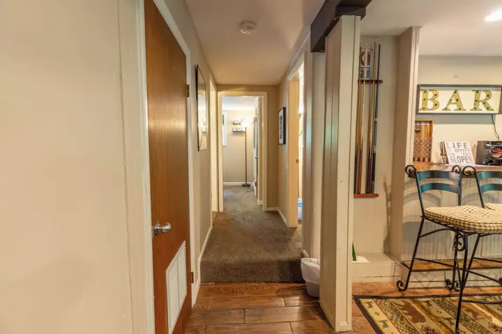 Hallway lower level to two bedrooms and bathroom