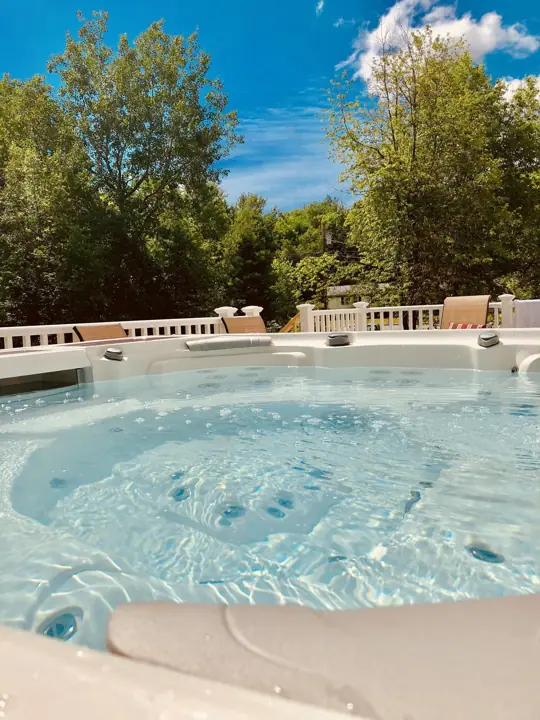 Outdoor hot tub on deck