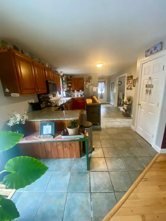 View from the pellet stove in the living room into kitchen