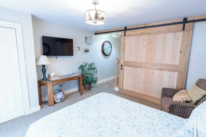 Barn door for privacy and nice flat screen
