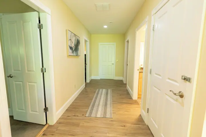 Hallway to lower bedrooms