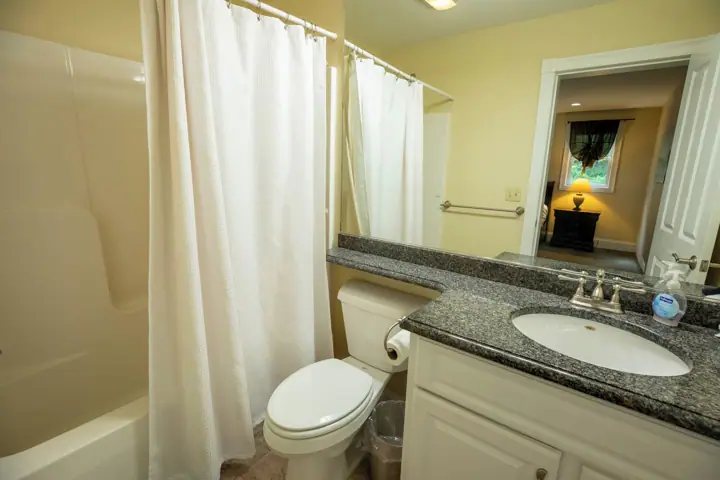 Private bathroom lower master with two queen beds